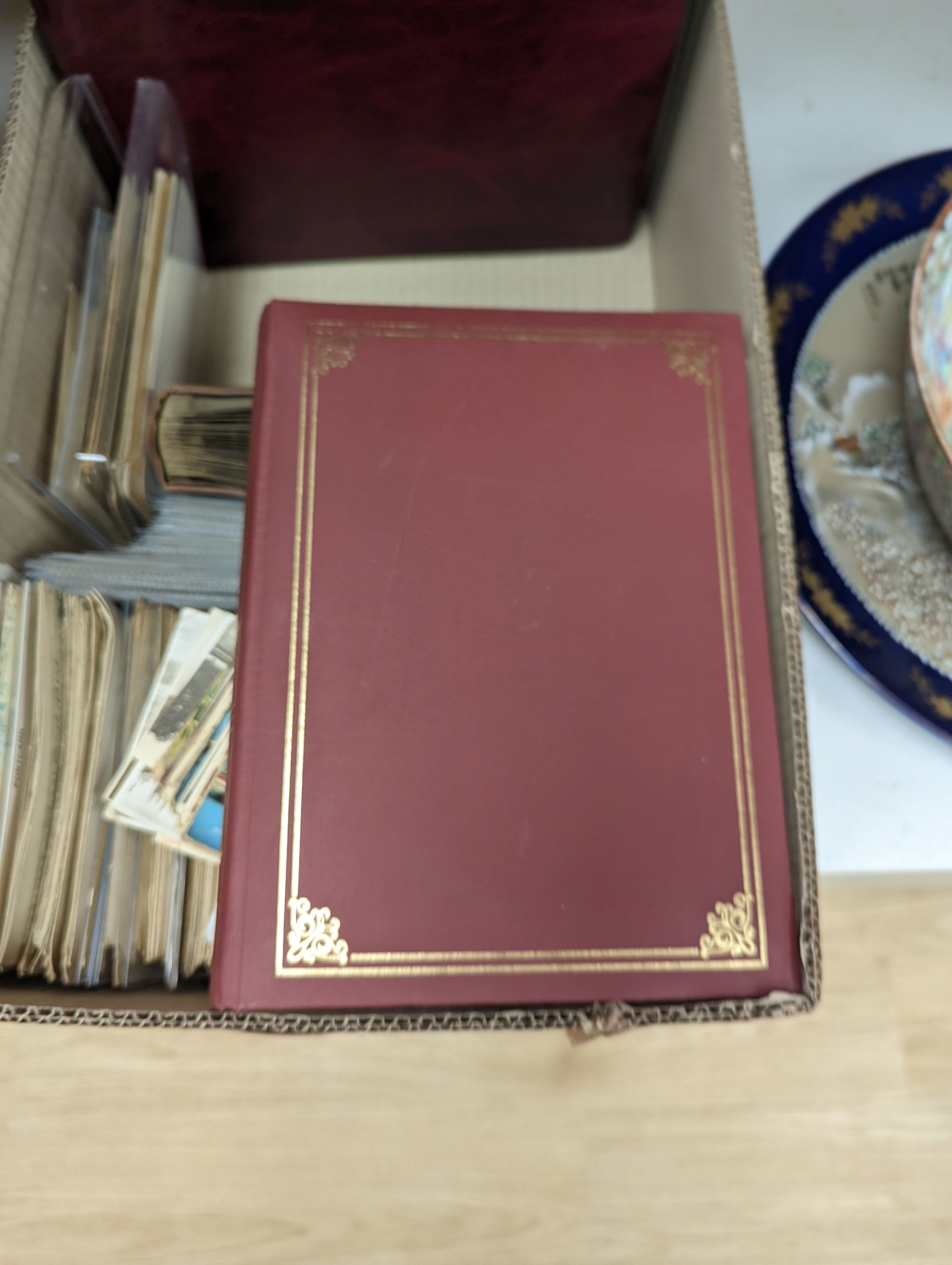 Four albums of postcards and a large collection of loose postcards, mainly British topographical, Victorian cabinet photographs, etc.